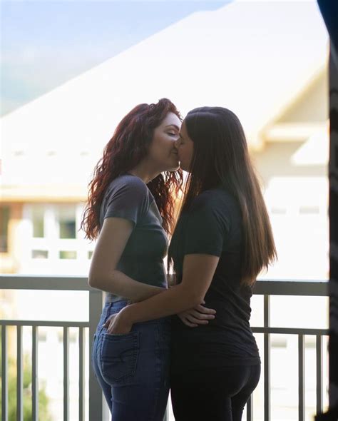 4k Lesbian women kiss and sit on rooftop... 